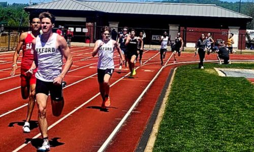Oxford’s Matt Tippets runs to victory in the 800-meter dash Wednesday, completing a sweep of the three individual distance events in the Calhoun County meet. He set a new record in the 1,600 and was named the most valuable athlete of the boys’ meet. (Photo by Joe Medley/East Alabama